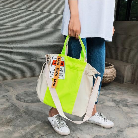 韓国 3色 ネオンカラー タグ カジュアル 巾着型 トートバック 中国発レディスファッション 株式会社 繋 現在 リモートワークにつき お問い合わせはメールのみ対応しております 問屋 仕入れ 卸 卸売の専門 仕入れならnetsea