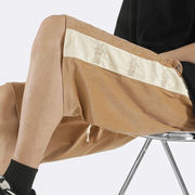 桃の毛皮のショートパンツアメリカンレトロ夏カジュアルゆったりスポーツパンツ男性ファッションブラン