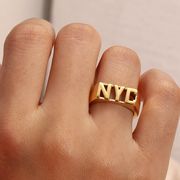 欧米のファッションアルファベット指輪 18Kゴールドメッキチタンスチール 男女兼用リング アクセサリー